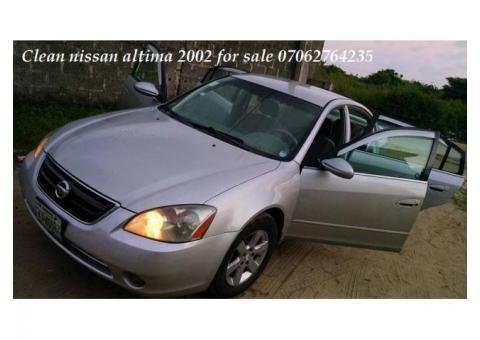 clean nissan altima 2002 going for  700,000