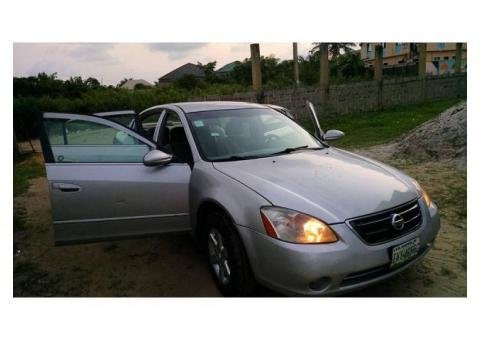 Sharp nissan altima 2002 for sale 700000, call 07062764235