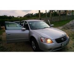 Sharp nissan altima 2002 for sale 700000, call 07062764235