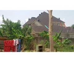 COFFEE/BLACK PATCH STONE COATED SHINGLE ROOF IN LAGOS